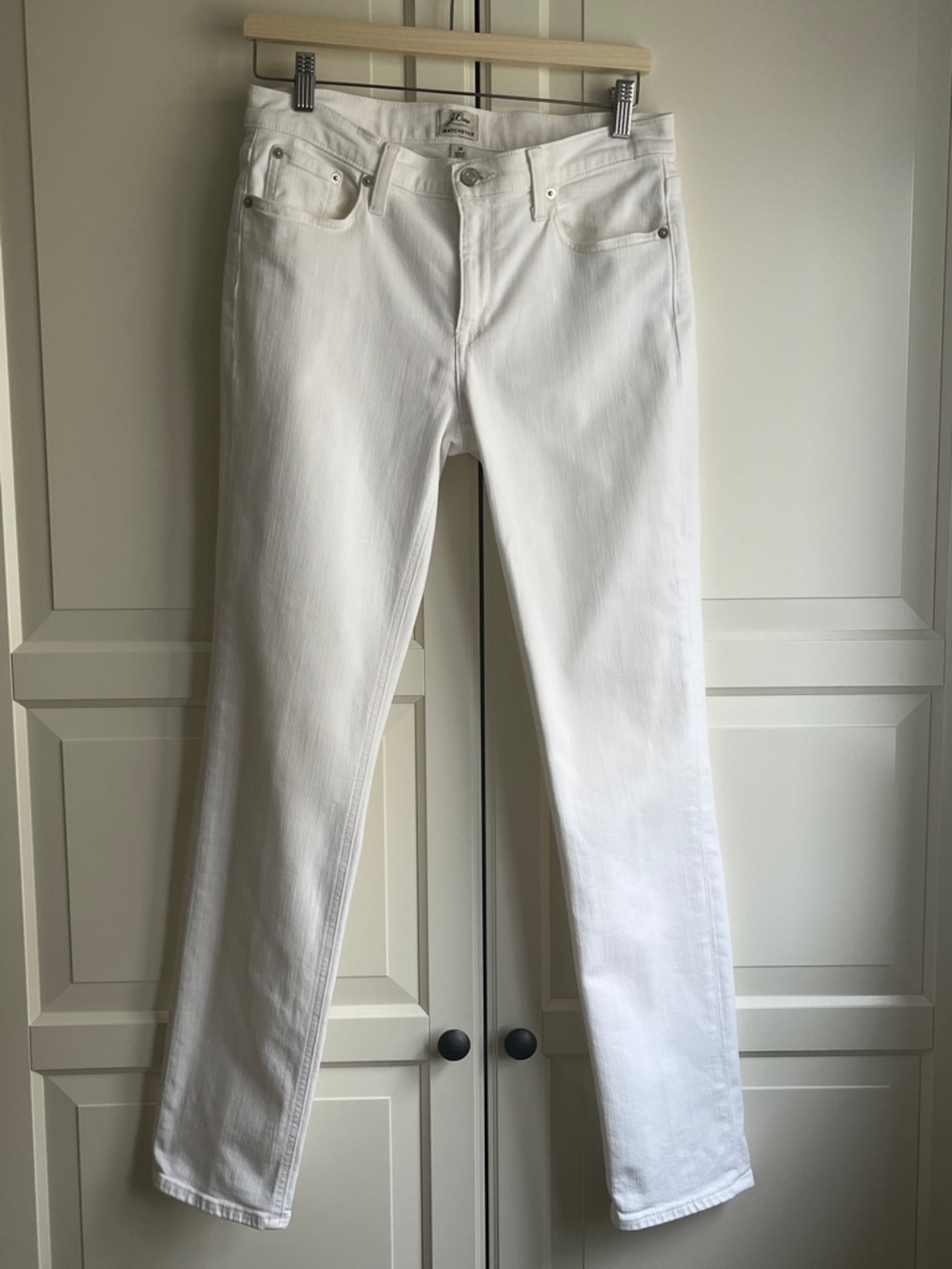 J Crew Matchstick white, mid-rise, straight leg 5 pocket jean. US 28